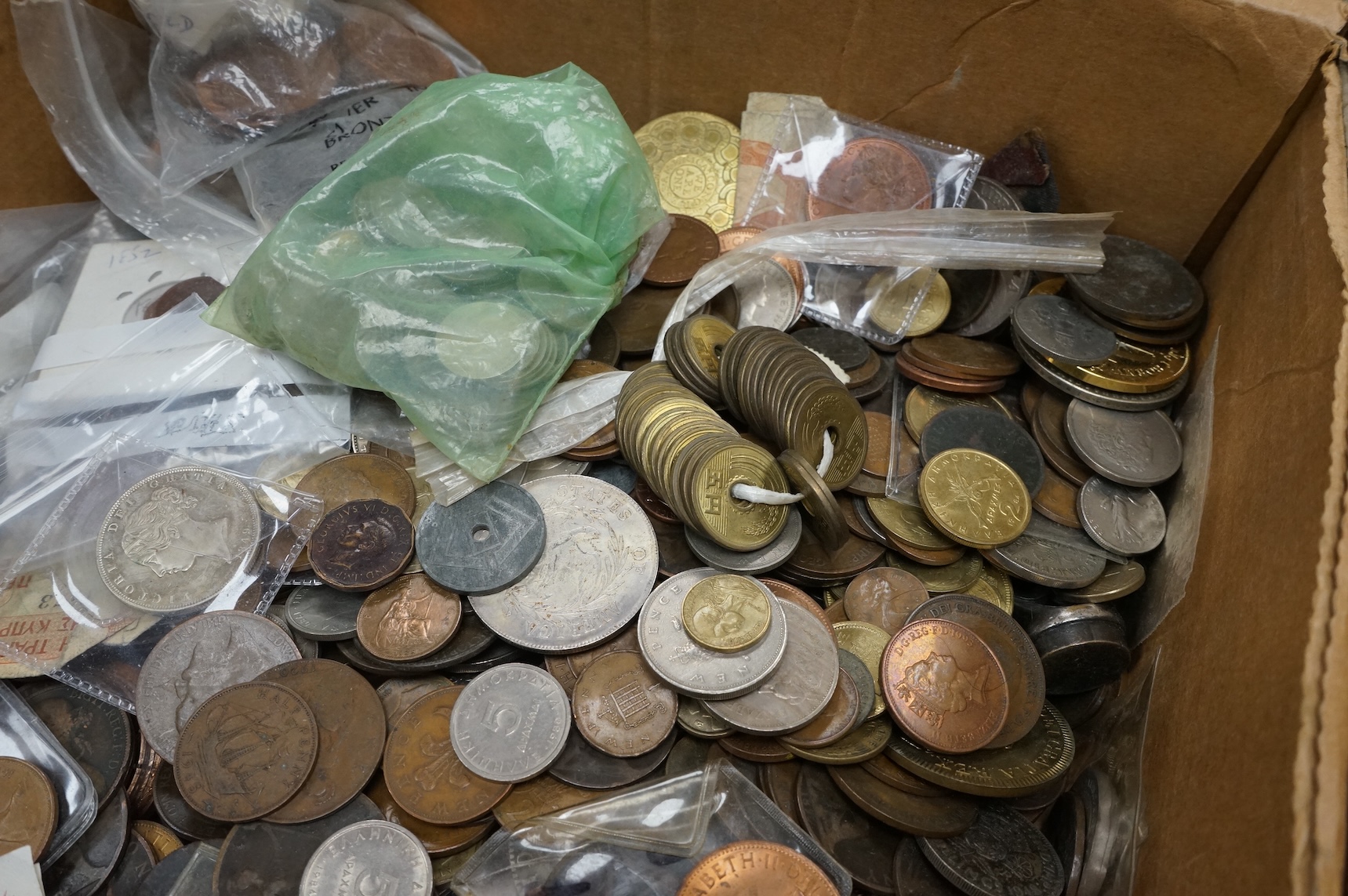 A large collection of mixed world coins, and replica coins